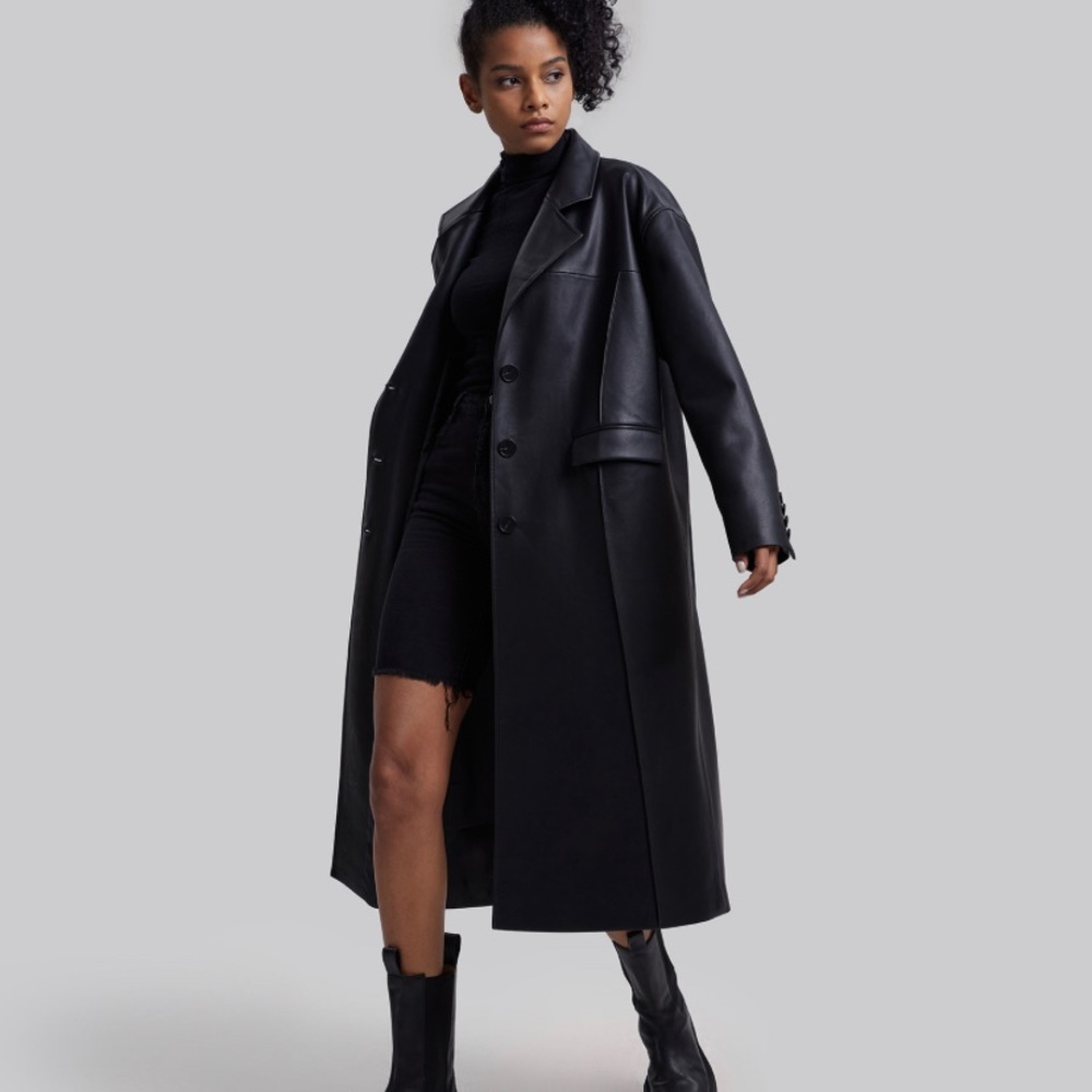 BRAND NEW, NEVER WORN buttery faux leather trench coat. ONE BUTTON IS LOOSE